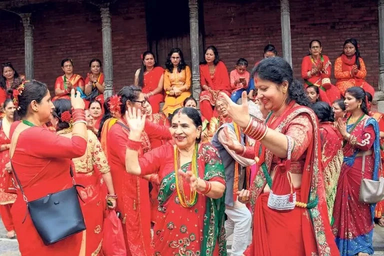 Nepalese women dancing in Red Sari during Teej Festival