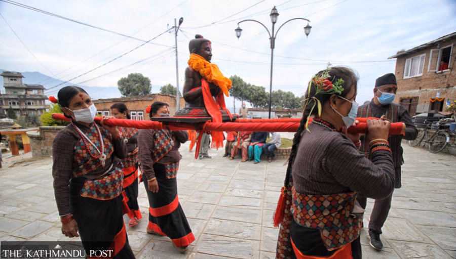 Newari women celebration carrying staute of Nepal Sambat pioneer Sankhadar Sakhwa during Newari New Year