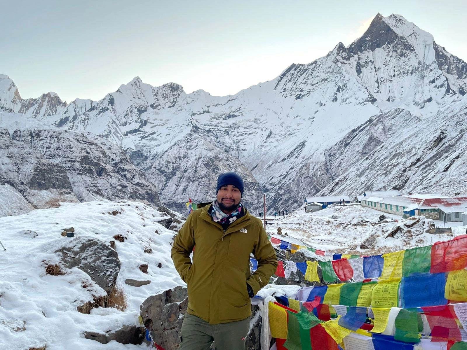 ramhari-adhikari-in-front-of-the-annapurna-base-camp.webp