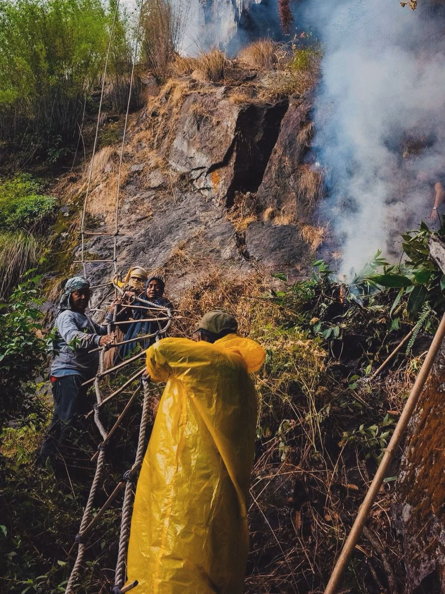 Rope ladder setup by villagers for mad honey Harvesting